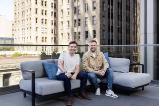Finn Puklowski and Jason Goodison on a rooftop terrace